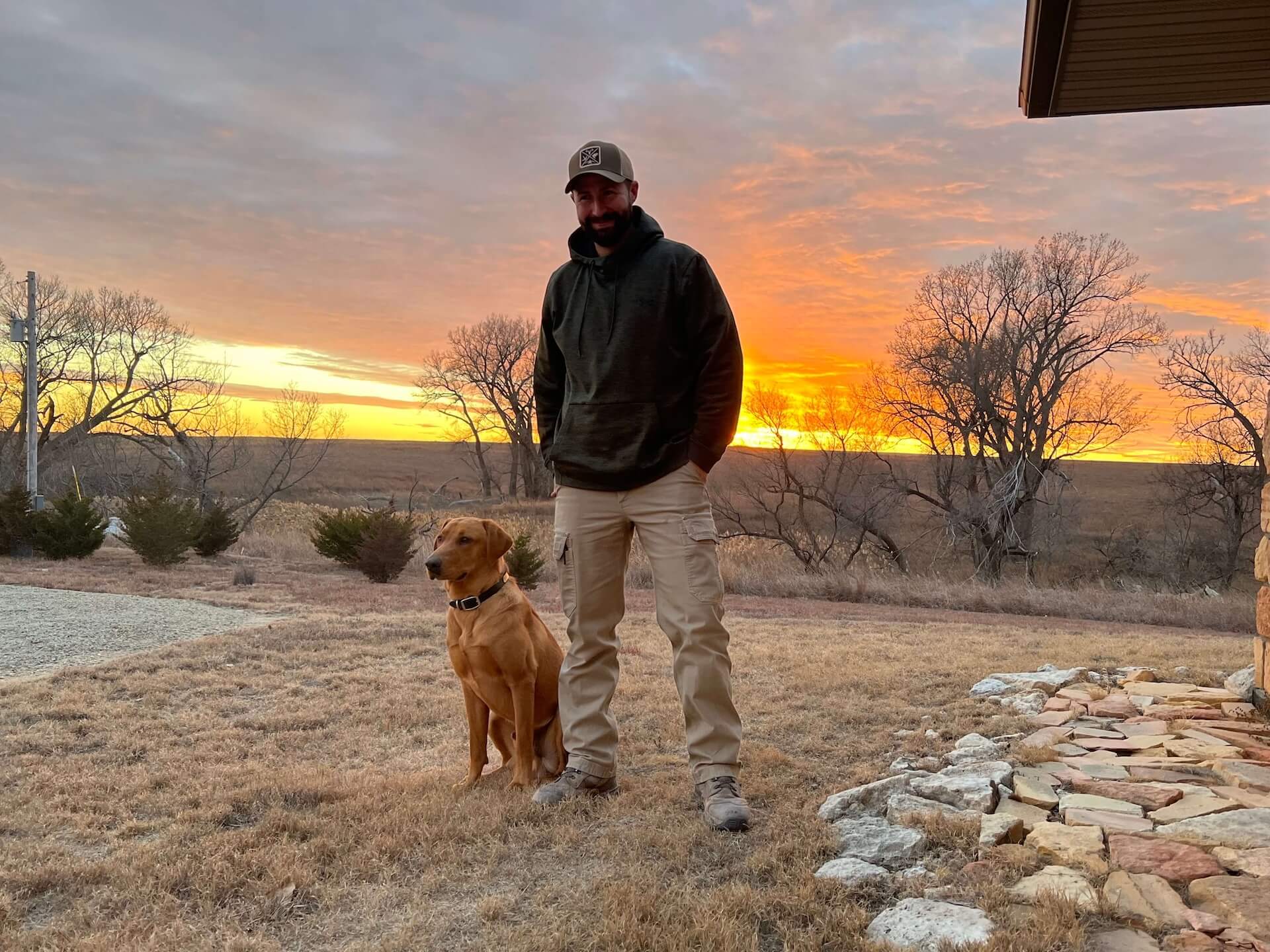 Dr. Jesse Saul, DVM Page Animal Wellness with labrador in Page, AZ 